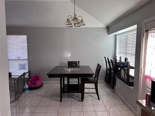 a view of a hallway with shelves