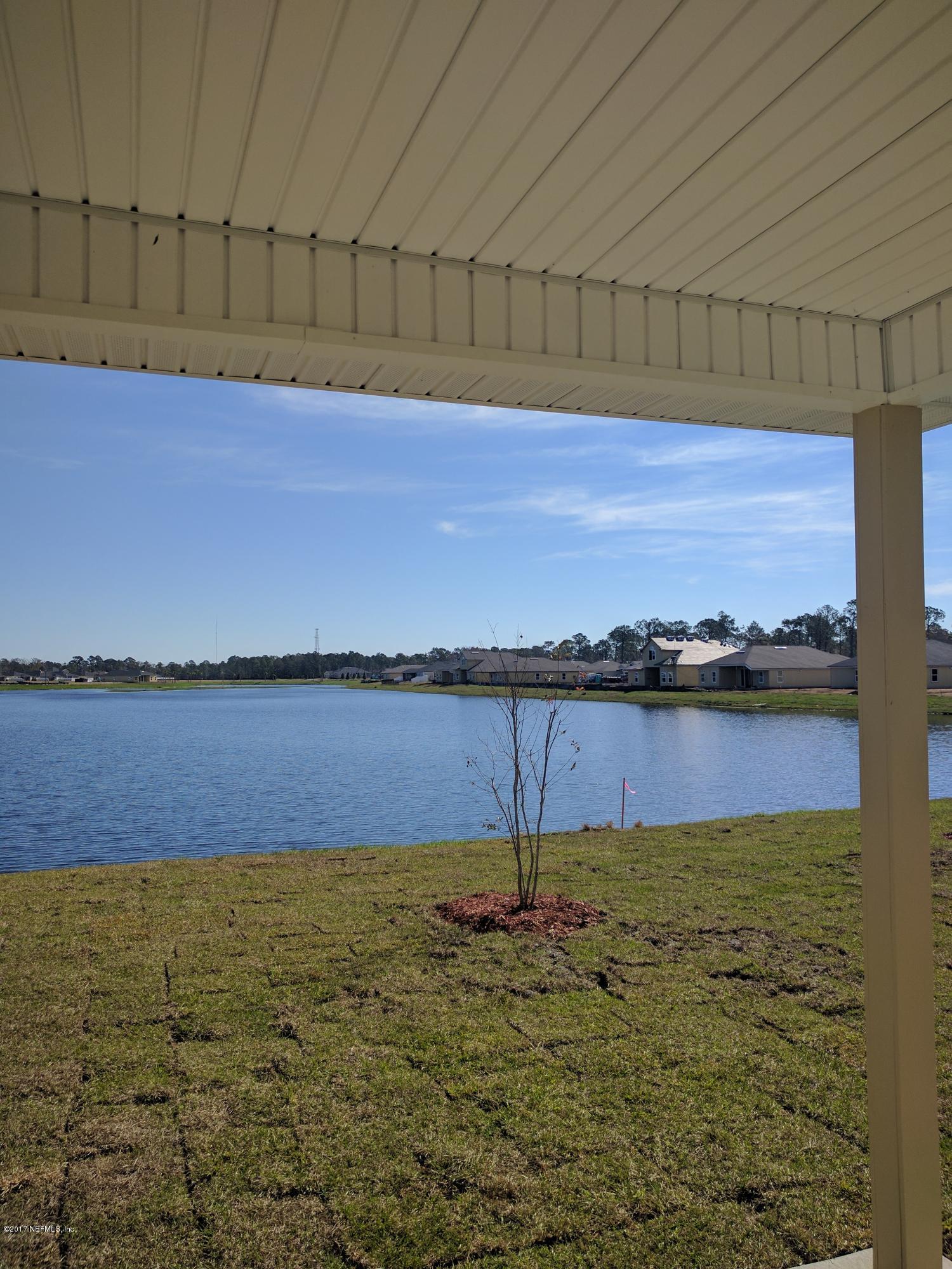 516 Deer Crossing Road St. Augustine, FL 32086 - Photo 7 of 43 a view of a lake