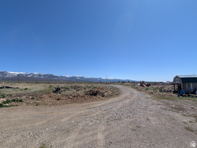 11799 Cove Creek Road Mount Pleasant, UT 84647 - Photo 7 of 15 View of dirt / gravel road with a mountain view and a view of countryside