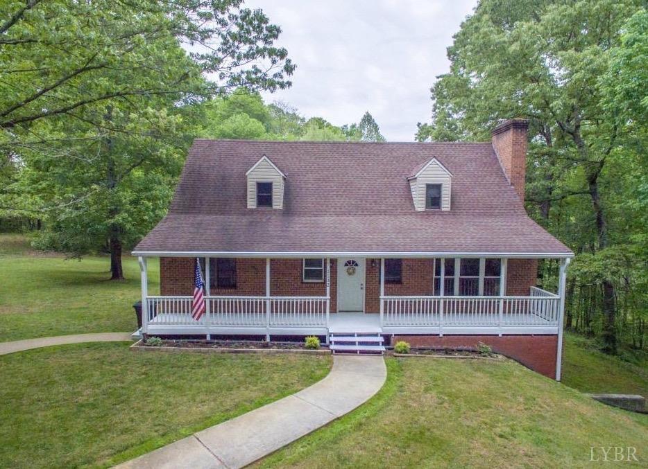 a view of a house with a swimming pool