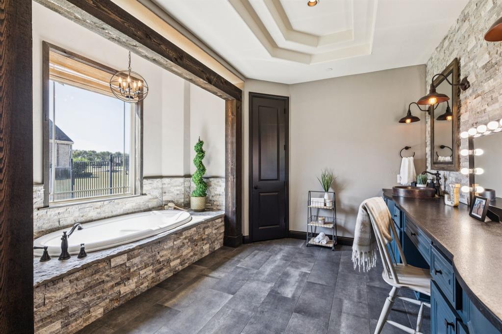 1545 Sara Cove Lucas, TX 75002 - Photo 17 of 40 Spa-like experience with natural finishes; double shower with rain spray head