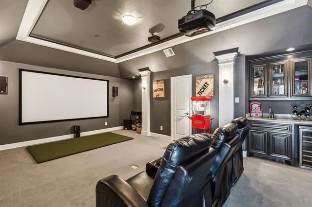 a room with lots of counter top space and stainless steel appliances