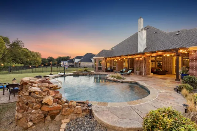 swimming pool view with a outdoor seating space