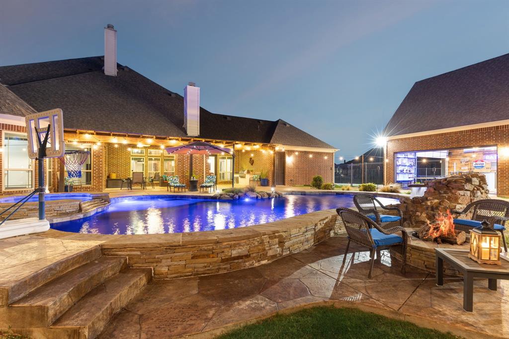 1545 Sara Cove Lucas, TX 75002 - Photo 32 of 40 Outdoor fire pit; customized pool lighting