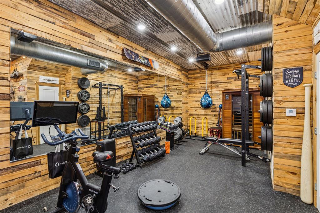 1545 Sara Cove Lucas, TX 75002 - Photo 33 of 40 Wood plank walls and gym flooring