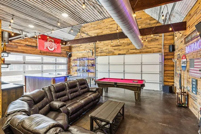 a outdoor living space with a couch and a table