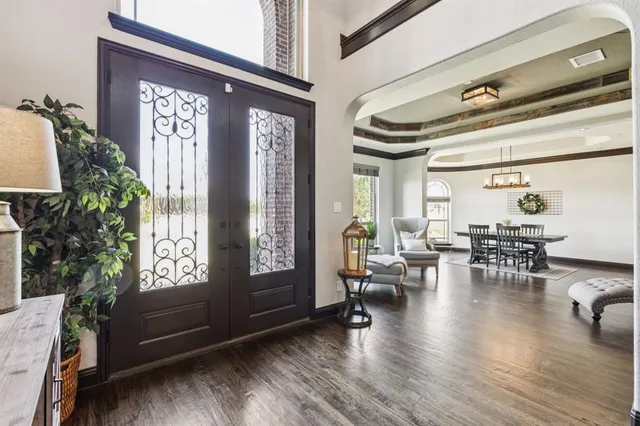 a view of a livingroom with furniture and a window
