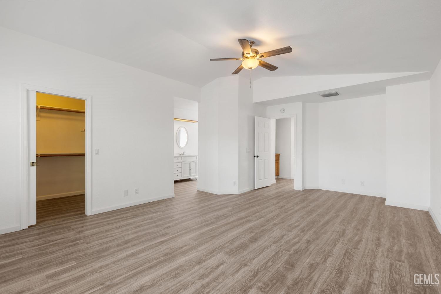 Undisclosed Address Ridgecrest, CA 93555 - Photo 18 of 34 a view of an empty room and wooden floor