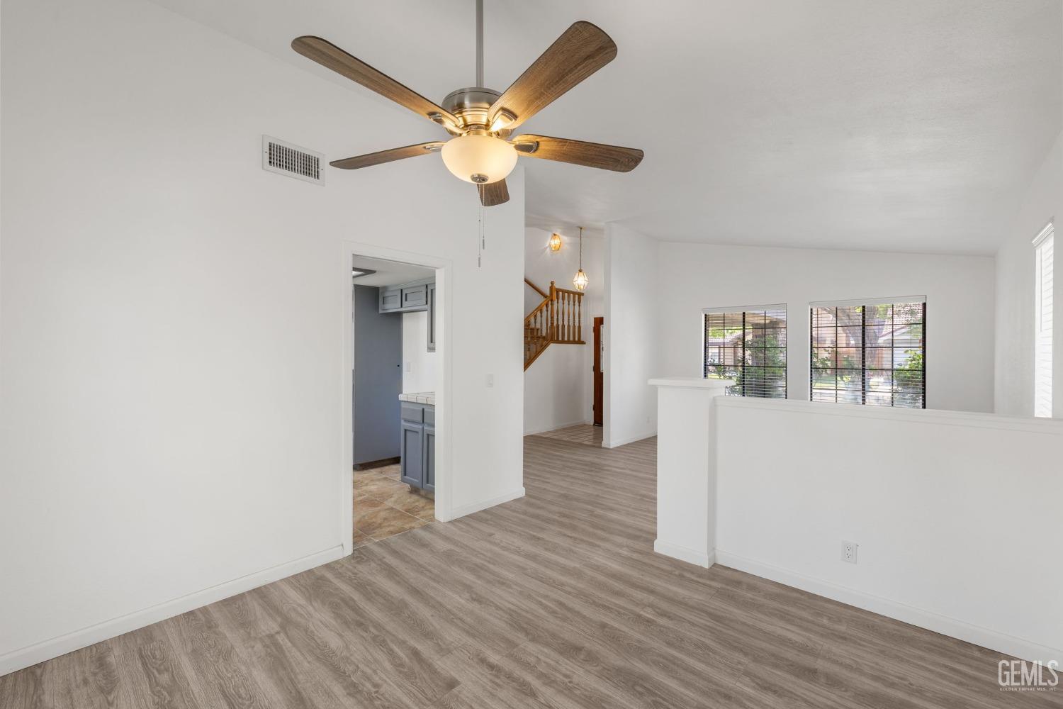 Undisclosed Address Ridgecrest, CA 93555 - Photo 8 of 34 wooden floor in an empty room with a window