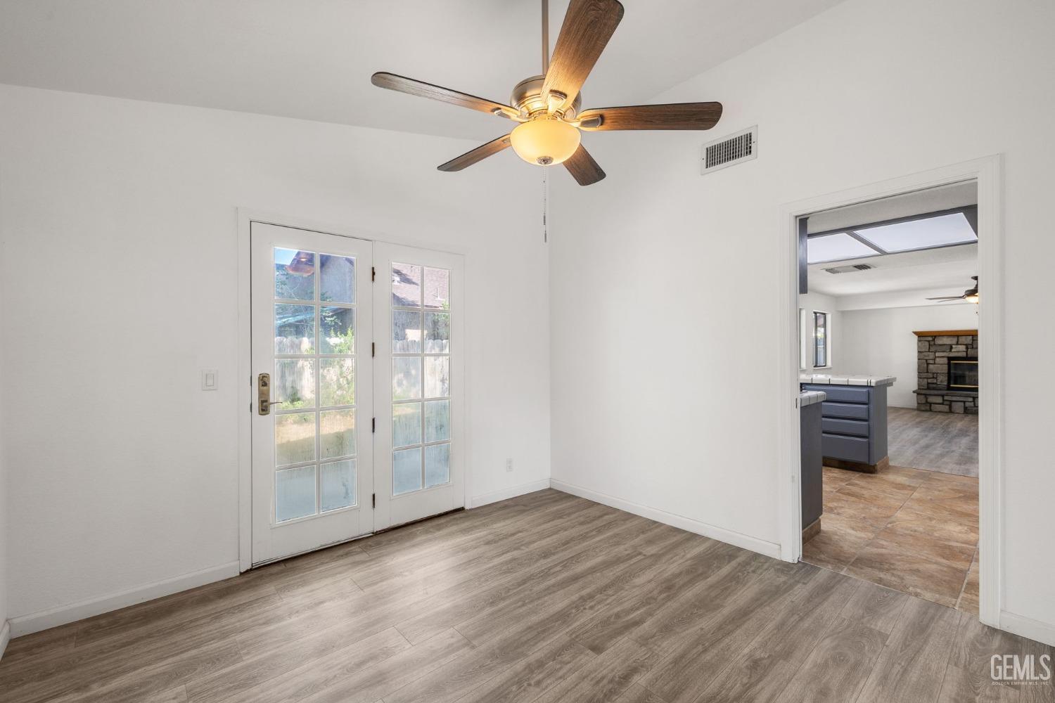 Undisclosed Address Ridgecrest, CA 93555 - Photo 9 of 34 a view of empty room with wooden floor