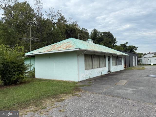 8286 James Madison Parkway King George, VA 22485 - Photo 11 of 26 a view of a house with a yard
