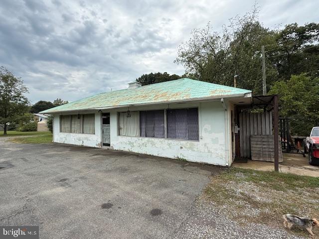 8286 James Madison Parkway King George, VA 22485 - Photo 13 of 26 a view of a house with a yard and garage
