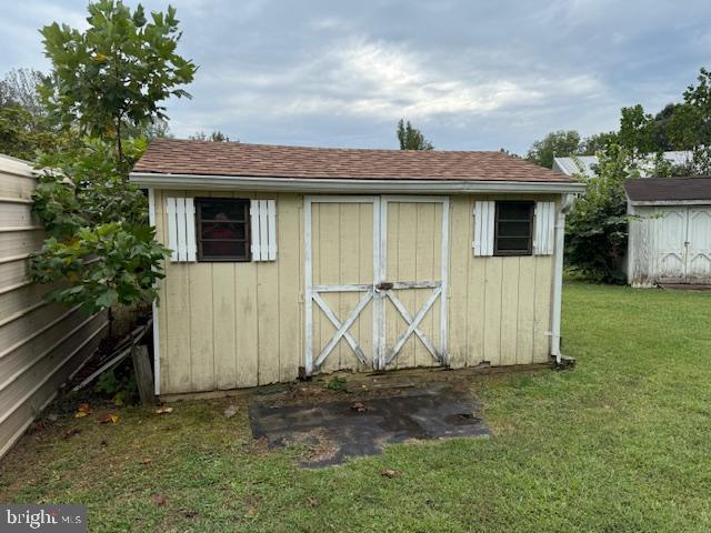 8286 James Madison Parkway King George, VA 22485 - Photo 15 of 26 a view of a house with a yard