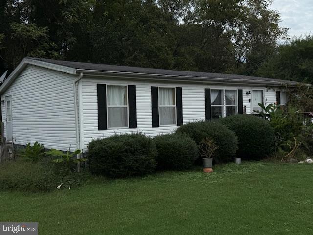 8286 James Madison Parkway King George, VA 22485 - Photo 23 of 26 a view of a house with a backyard