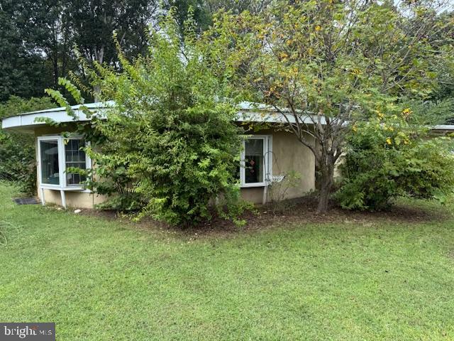 8286 James Madison Parkway King George, VA 22485 - Photo 3 of 26 a view of a house with a yard