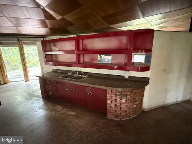 a room with fireplace and window