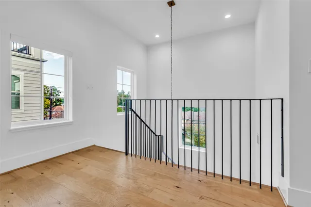 a view of a hallway with a window