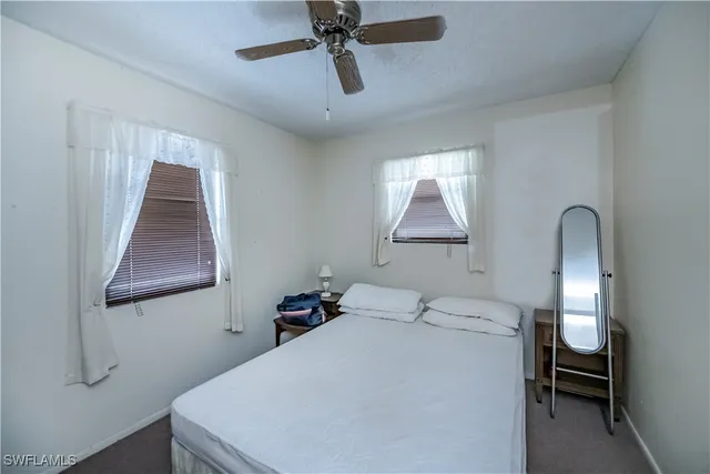 a view of storage and utility room with washer and dryer