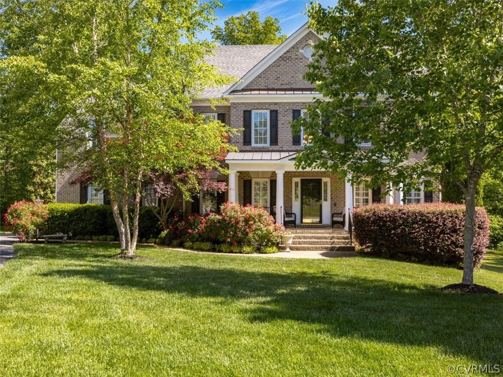 13425 Tipple Point Road Midlothian, VA 23114 - Photo 1 of 42 a front view of a house with a yard