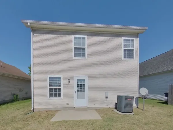 a view of a house with lounge chair