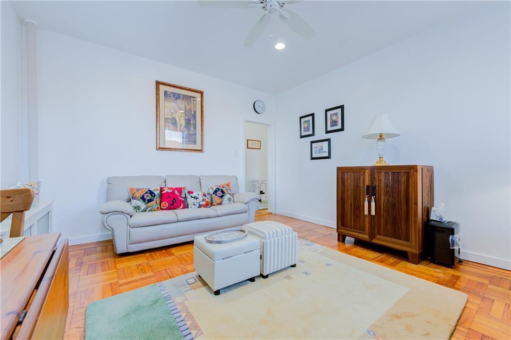 255 79th Street, Unit E11 Brooklyn, NY 11209 - Photo 12 of 34 a living room with baby toys and dresser