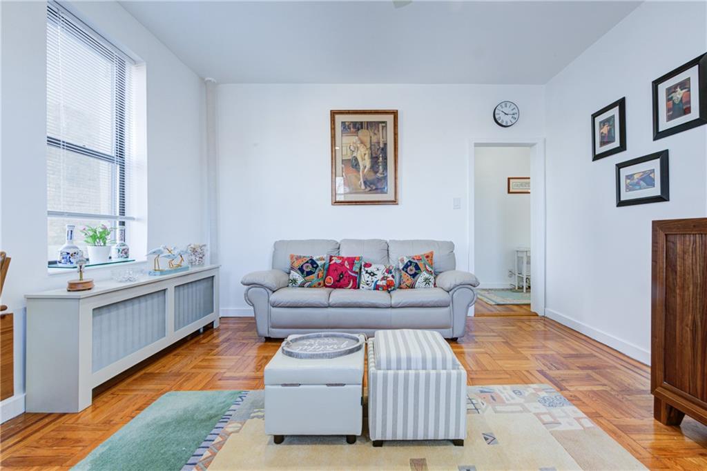 255 79th Street, Unit E11 Brooklyn, NY 11209 - Photo 14 of 34 a living room with furniture and window