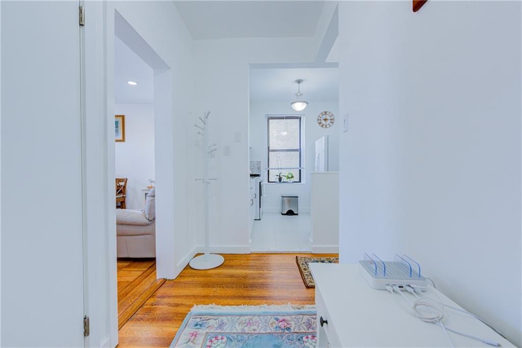 255 79th Street, Unit E11 Brooklyn, NY 11209 - Photo 18 of 34 a bathroom with a tub and sink