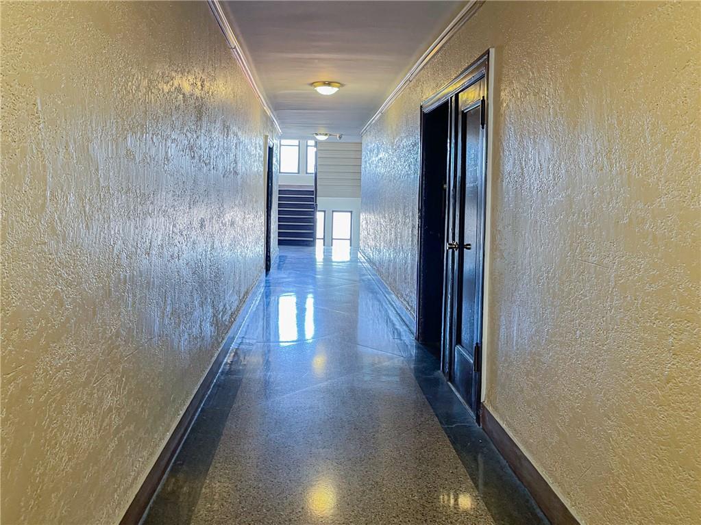 255 79th Street, Unit E11 Brooklyn, NY 11209 - Photo 7 of 34 a view of gallery with wooden floor