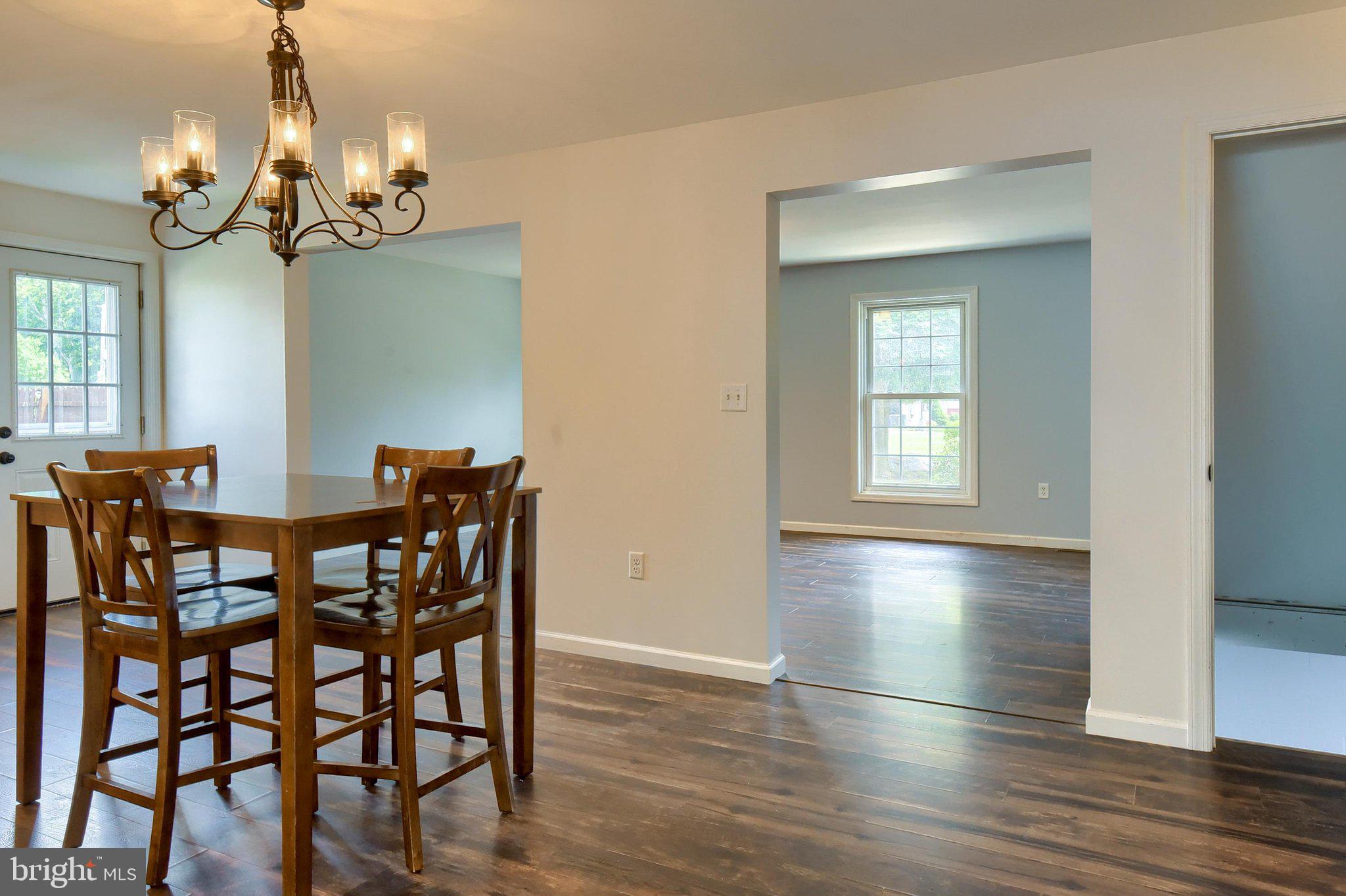 3740 Beagle Road Middletown, PA 17057 - Photo 10 of 70 a view of a dining room with furniture and chandelier