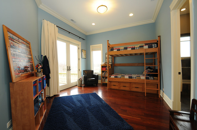10 Ruffled Feathers Drive Lemont, IL 60439 - Photo 21 of 25 a living room with furniture and a flat screen tv