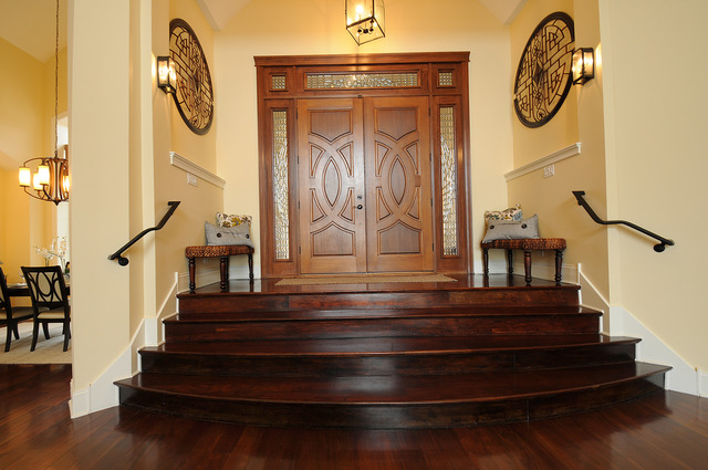 10 Ruffled Feathers Drive Lemont, IL 60439 - Photo 3 of 25 a view of staircase with wooden floor and a chandelier