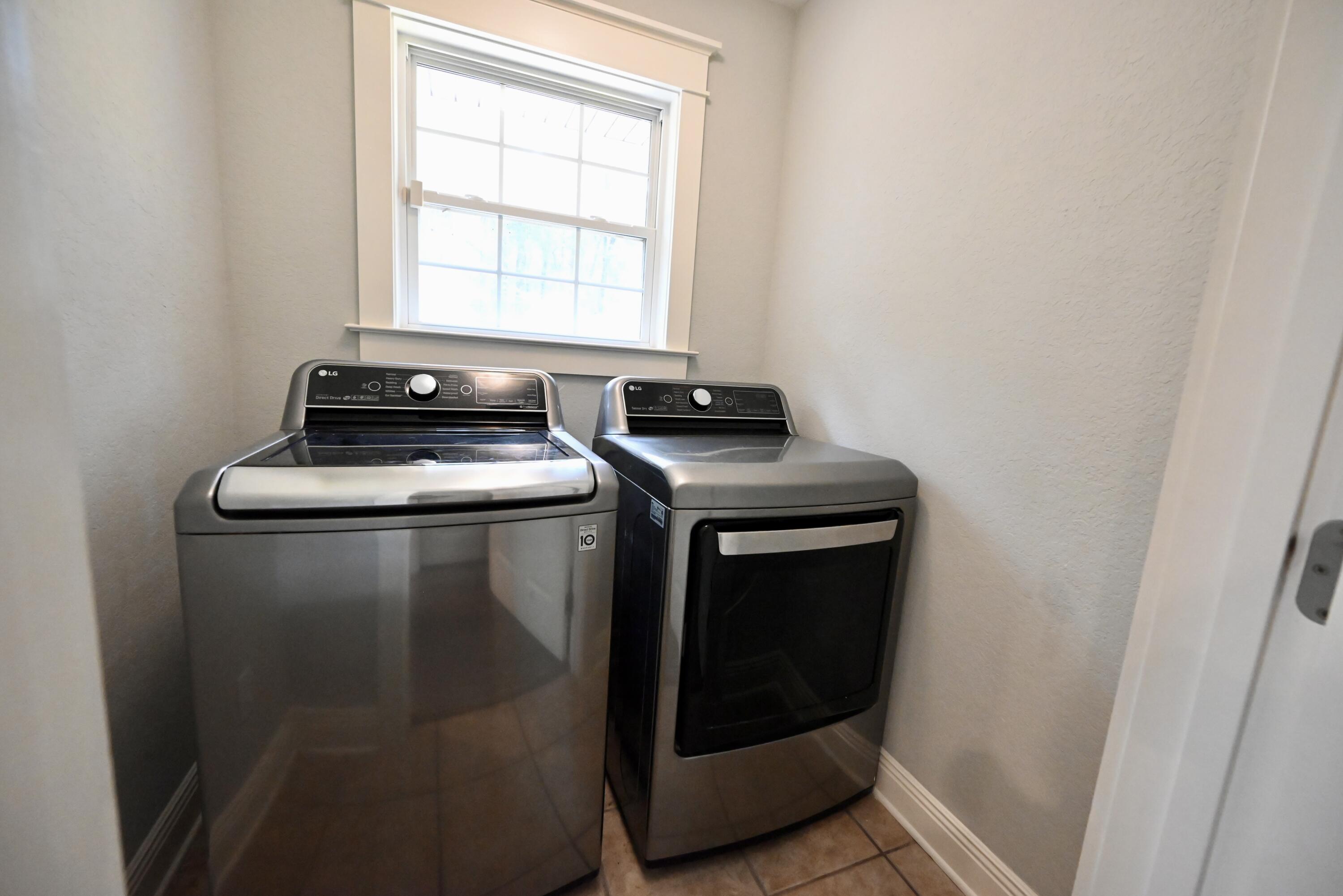 202 Shell Drive Crestview, FL 32536 - Photo 14 of 38 a room with washer and dryer