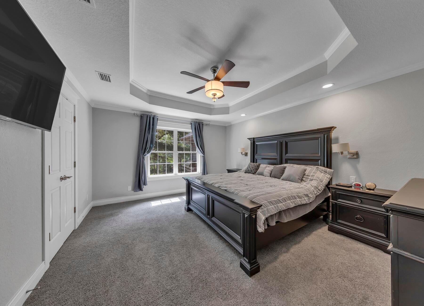 202 Shell Drive Crestview, FL 32536 - Photo 24 of 38 a bedroom with a bed and a ceiling fan