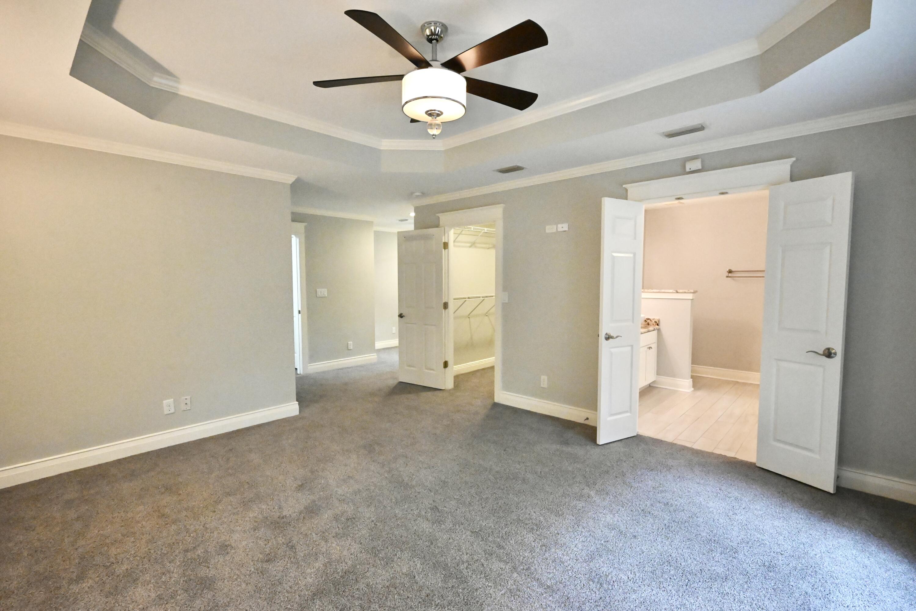202 Shell Drive Crestview, FL 32536 - Photo 26 of 38 a view of empty room with ceiling fan