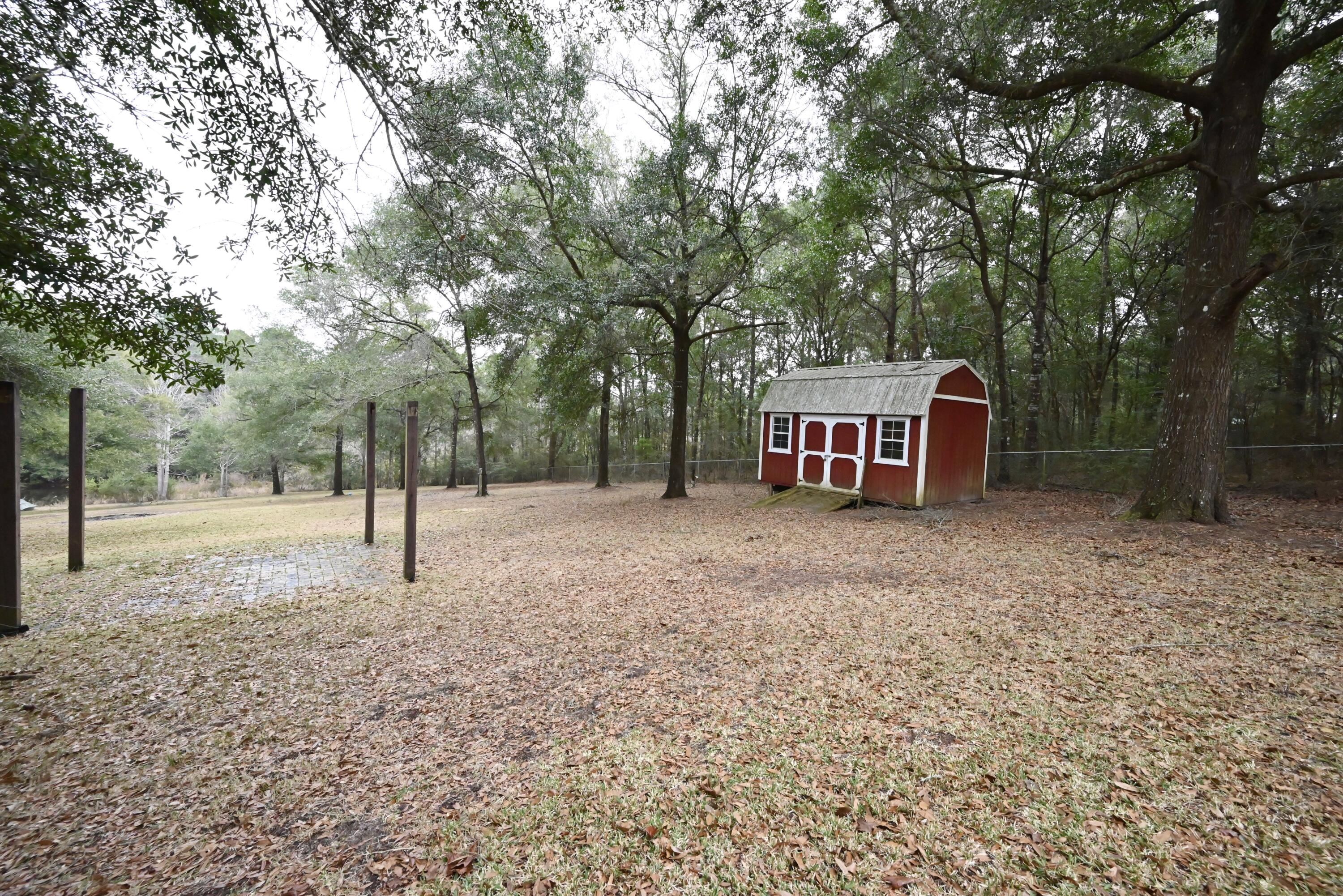 202 Shell Drive Crestview, FL 32536 - Photo 36 of 38 a house view with a backyard space