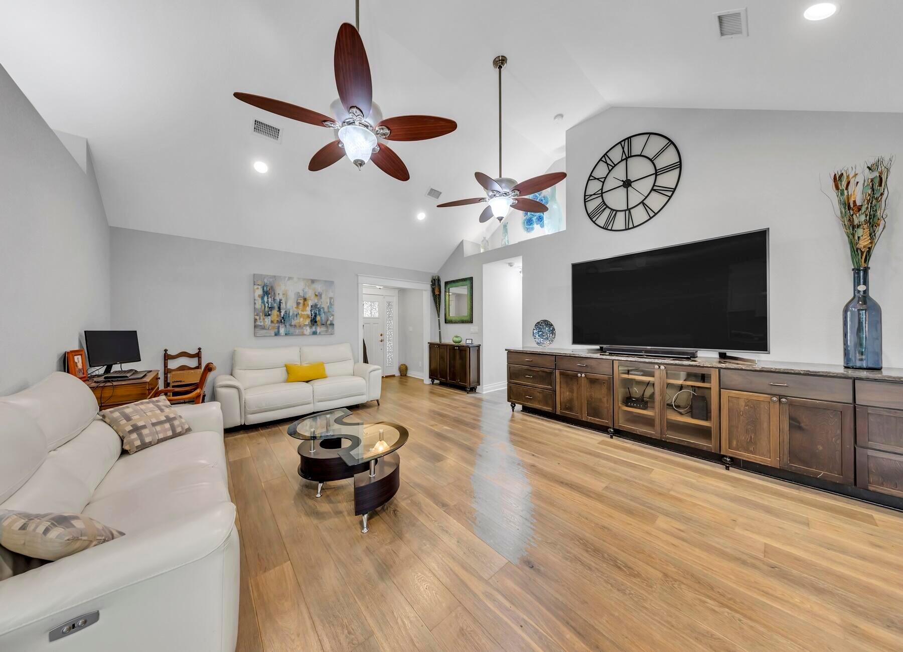 202 Shell Drive Crestview, FL 32536 - Photo 5 of 38 a living room with furniture and a flat screen tv