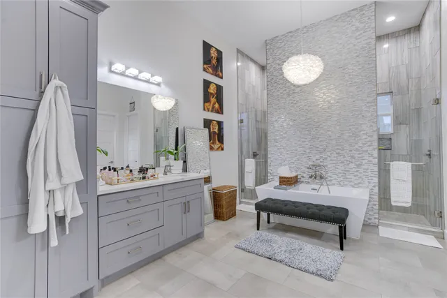 a bathroom with a double vanity sink and a mirror