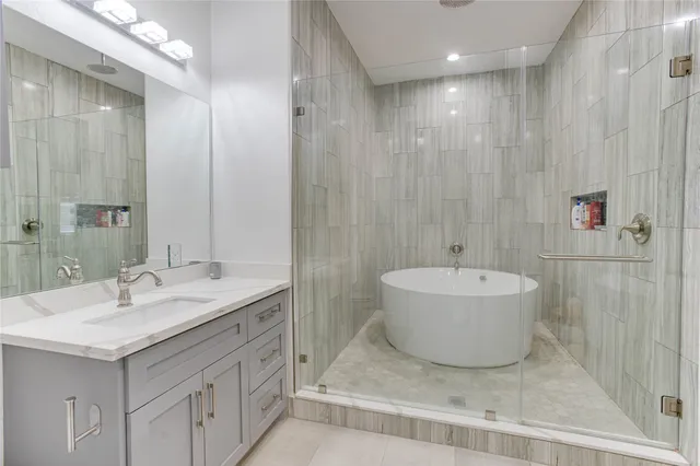 a bathroom with a sink and mirror