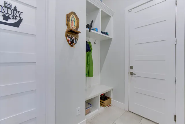 a backyard of a house with outdoor seating