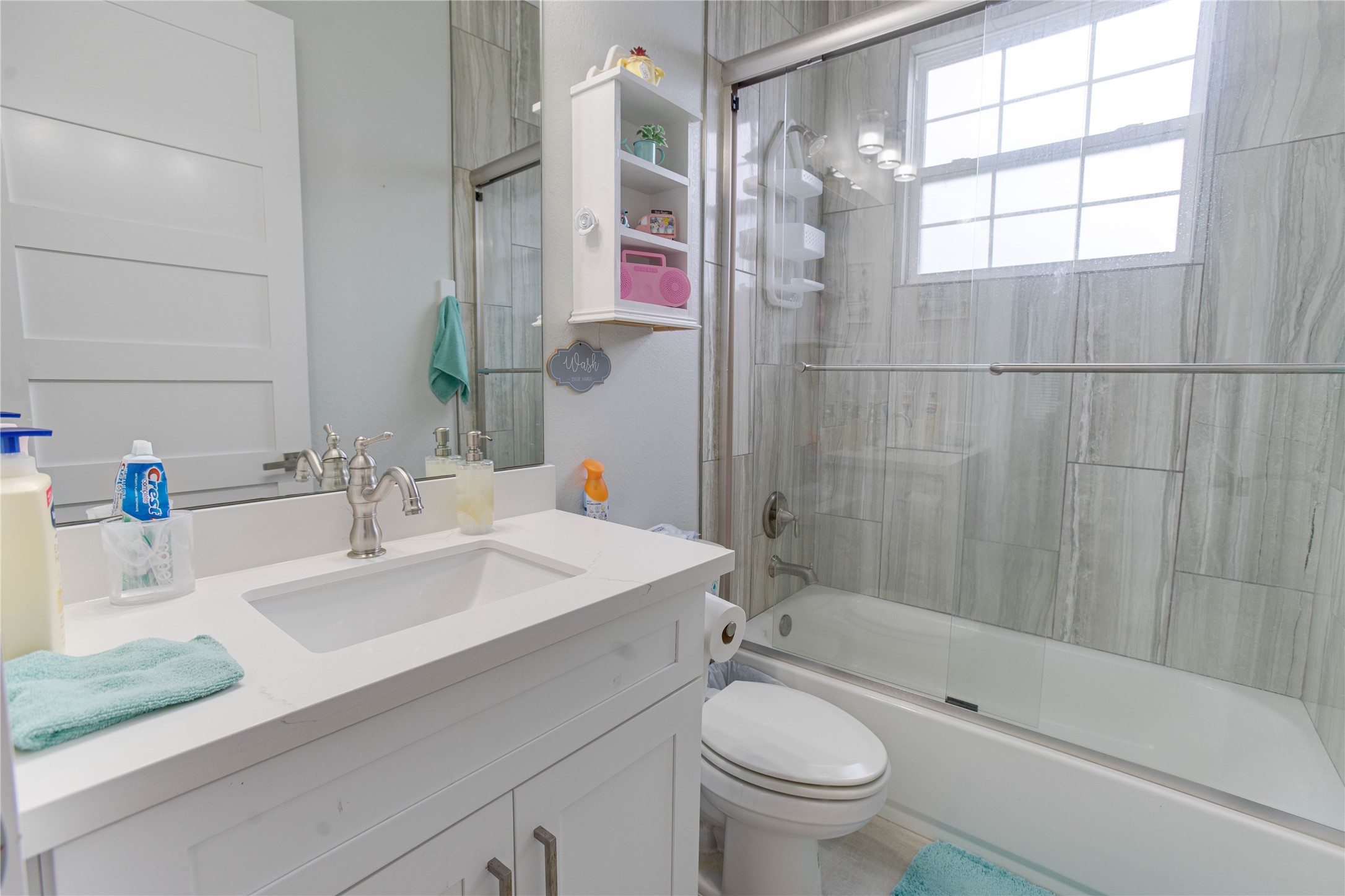 4821 1st Street Houston, TX 77504 - Photo 45 of 49 a bathroom with a sink a toilet and shower