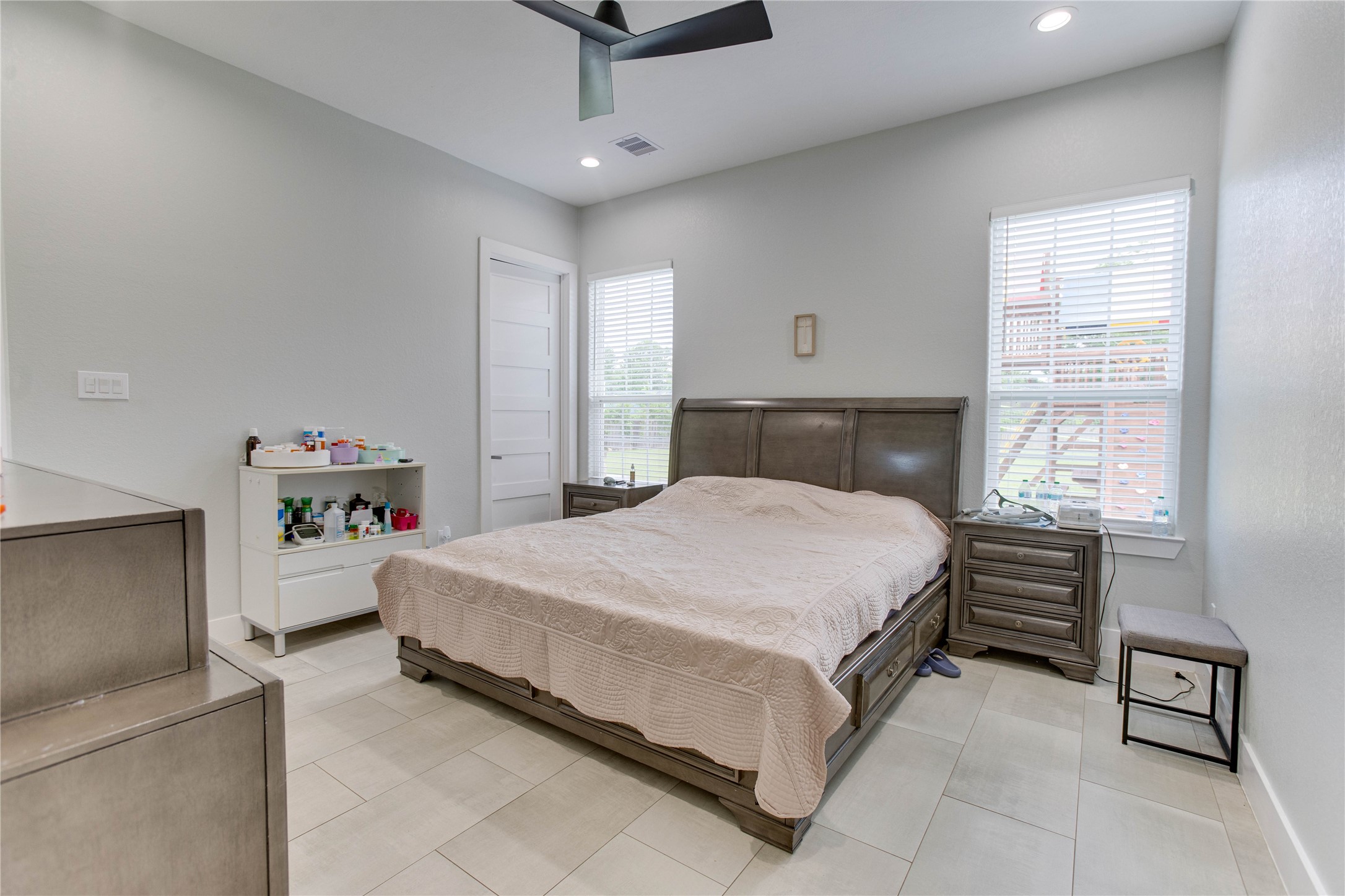 4821 1st Street Houston, TX 77504 - Photo 46 of 49 a bed room with a bed and a chandelier