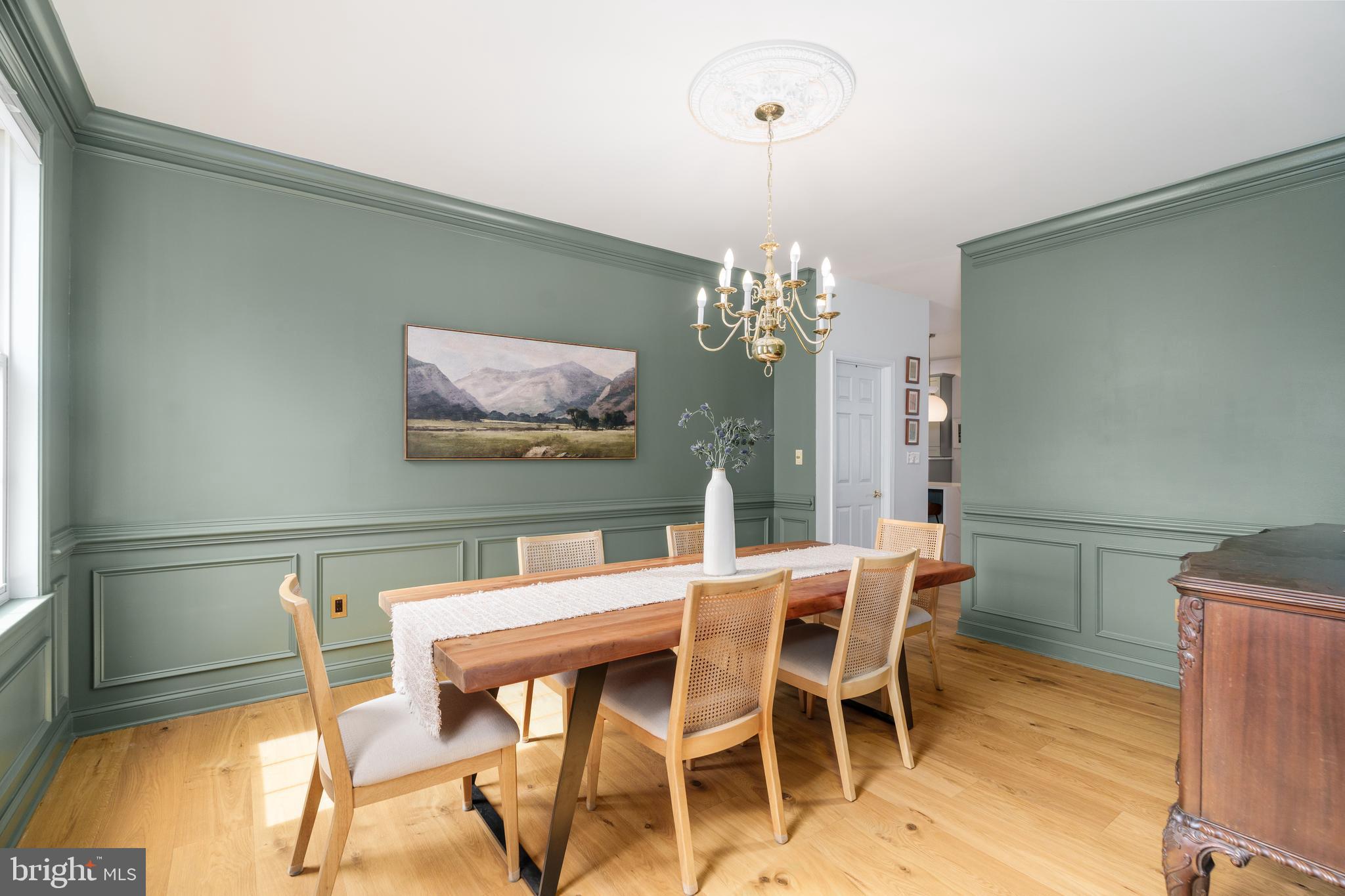 31 Wood Chip Road Elkton, MD 21921 - Photo 13 of 42 a dining room with furniture a chandelier and wooden floor