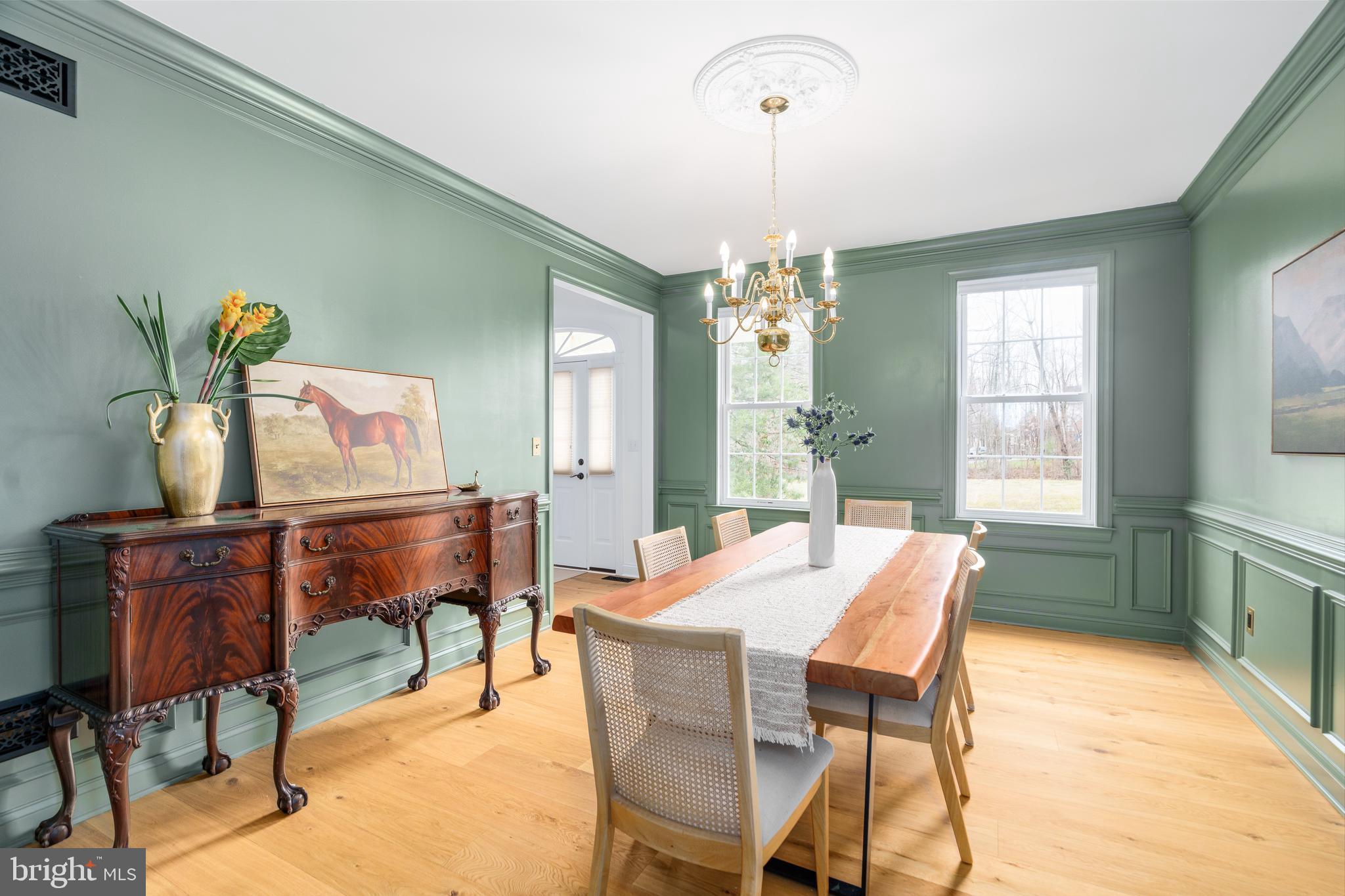 31 Wood Chip Road Elkton, MD 21921 - Photo 14 of 42 a dining room with furniture a chandelier and wooden floor