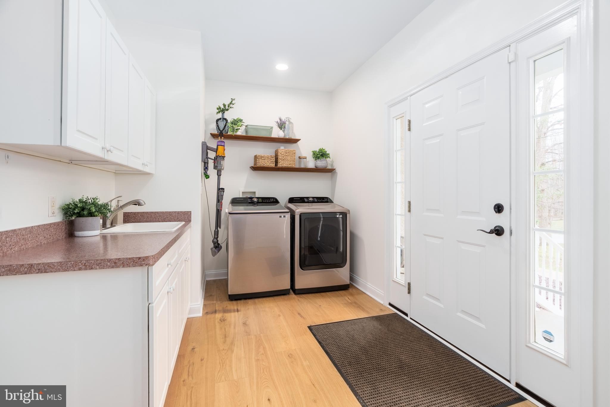 31 Wood Chip Road Elkton, MD 21921 - Photo 18 of 42 a kitchen with a sink a refrigerator and cabinets