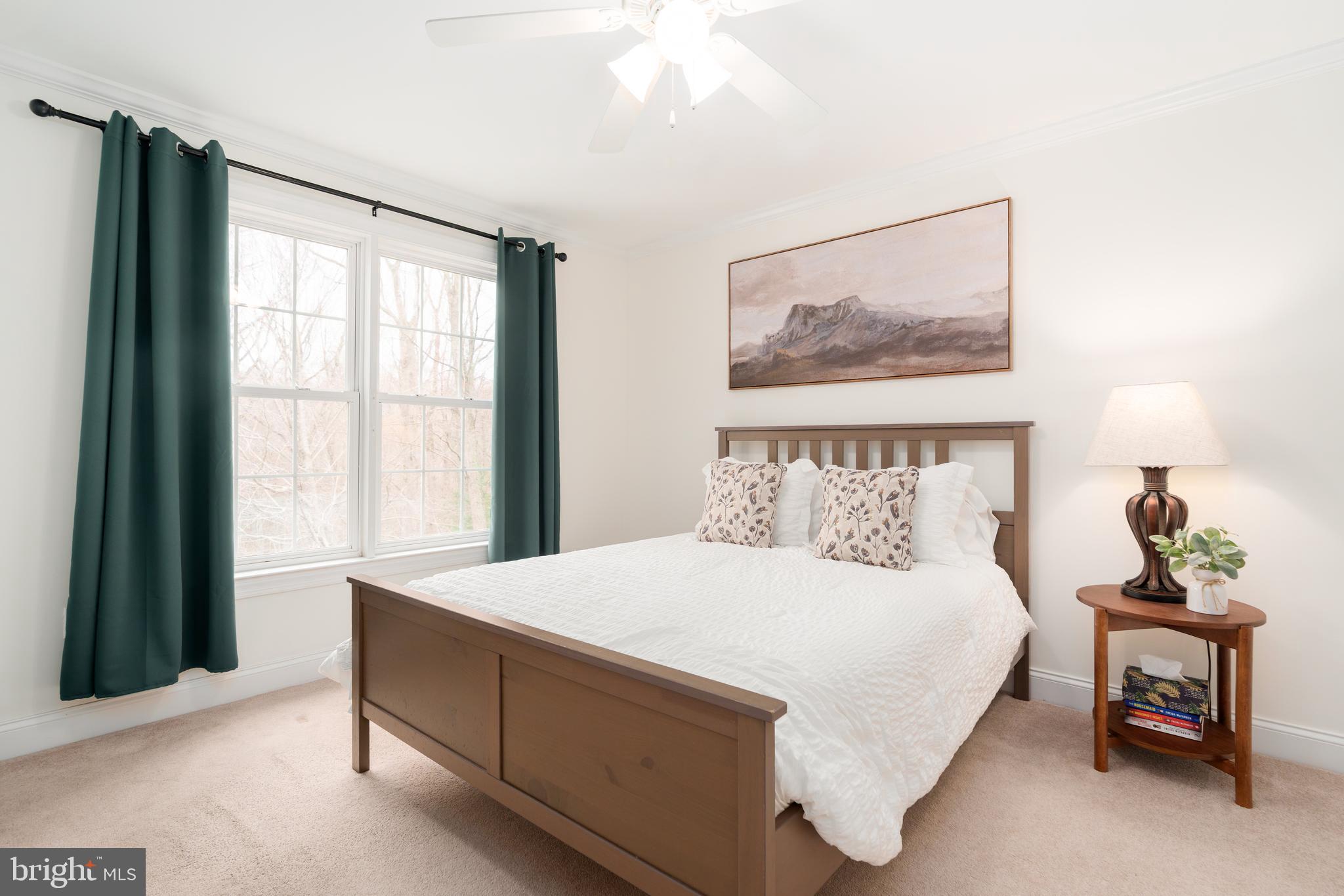 31 Wood Chip Road Elkton, MD 21921 - Photo 29 of 42 a bedroom with a bed and a painting on the wall