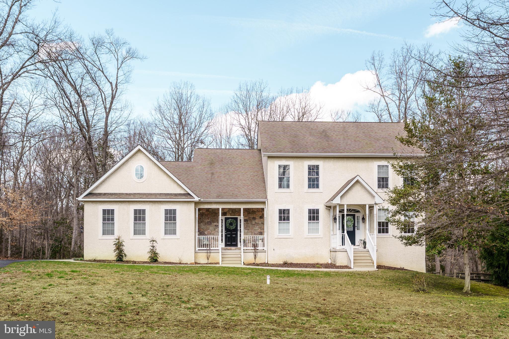 31 Wood Chip Road Elkton, MD 21921 - Photo 42 of 42 a front view of a house with a garden and trees
