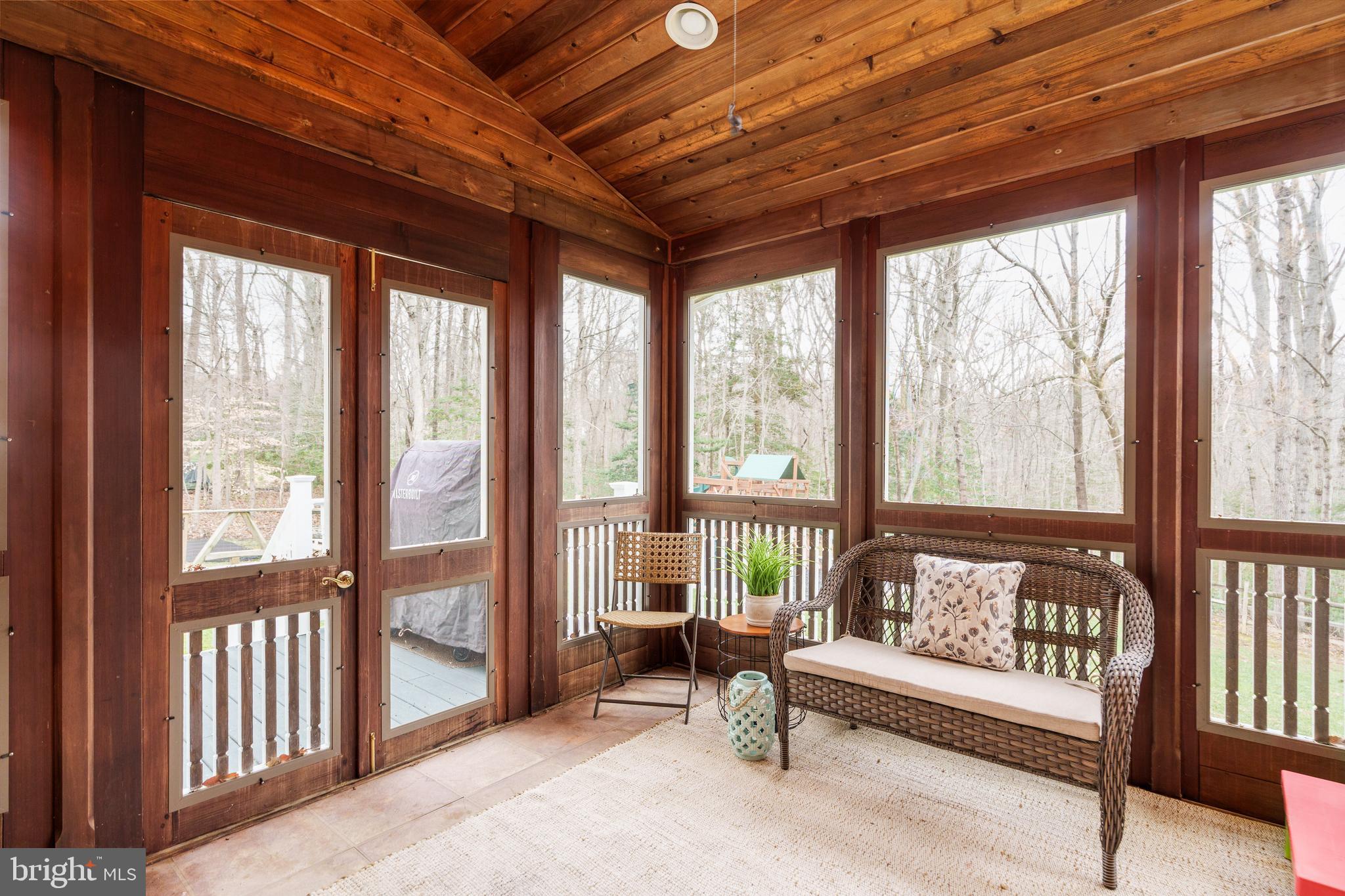 31 Wood Chip Road Elkton, MD 21921 - Photo 10 of 42 a living room with furniture and a floor to ceiling window