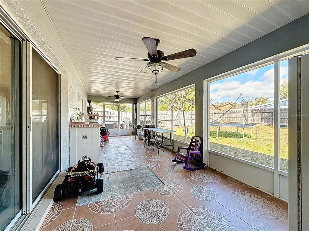 30 Hemlock Terrace Way Ocala, FL 34472 - Photo 32 of 44 a living room with furniture and a large window