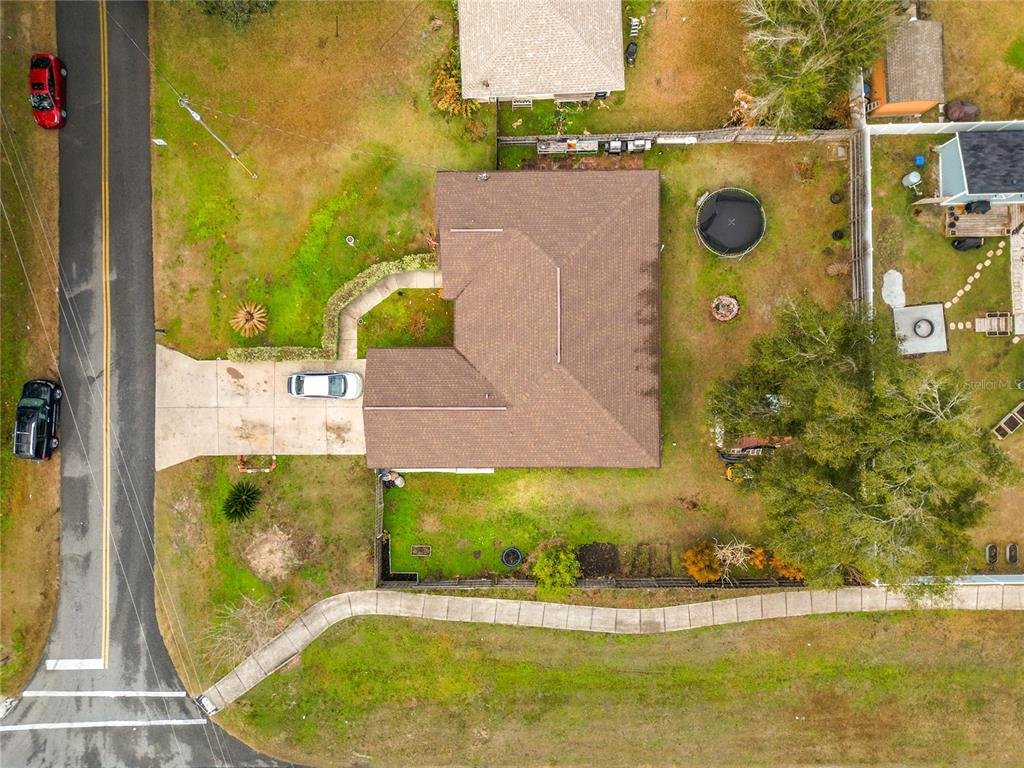 30 Hemlock Terrace Way Ocala, FL 34472 - Photo 42 of 44 view of swimming pool with a yard and seating area