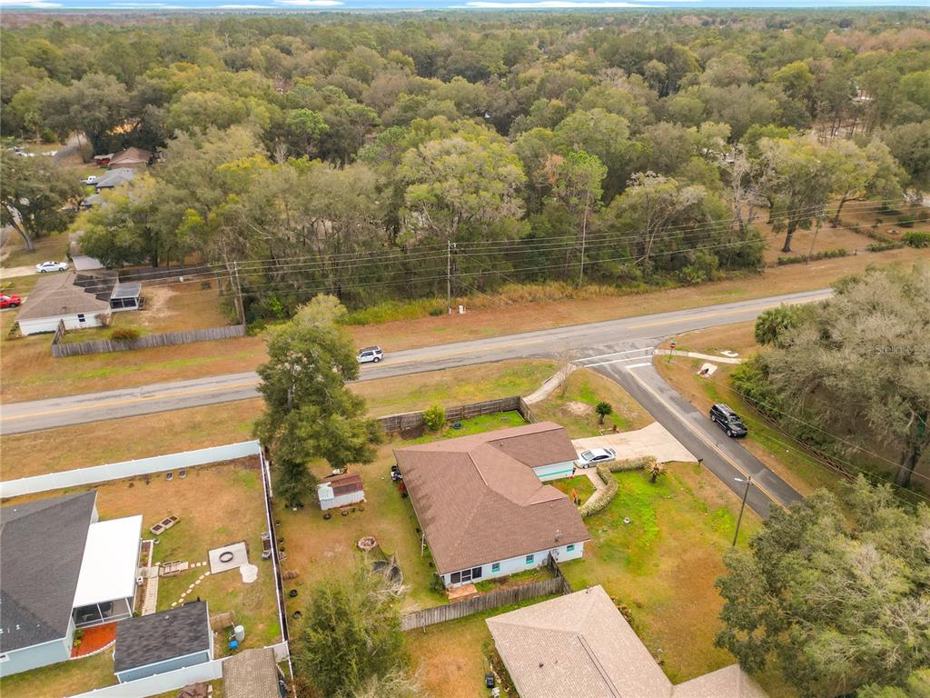 30 Hemlock Terrace Way Ocala, FL 34472 - Photo 44 of 44 an aerial view of a house with a swimming pool